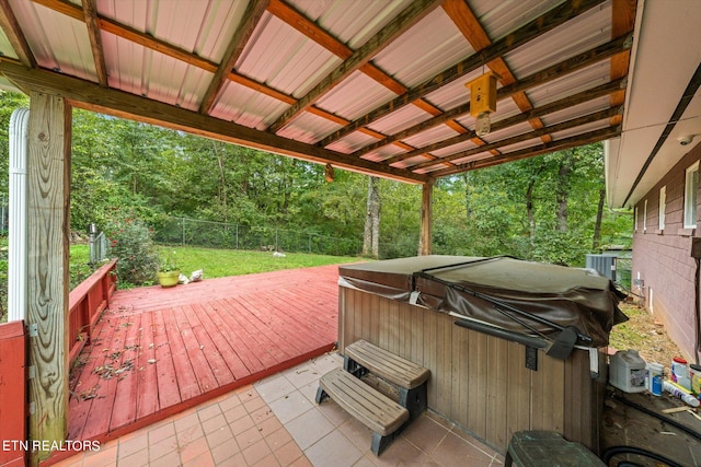 wooden deck featuring central AC and a hot tub