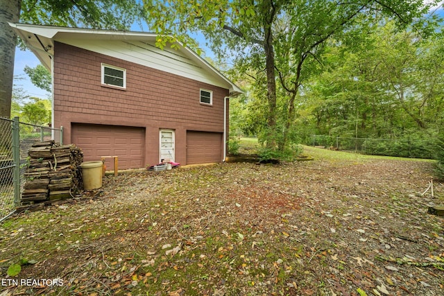 view of home's exterior featuring a garage