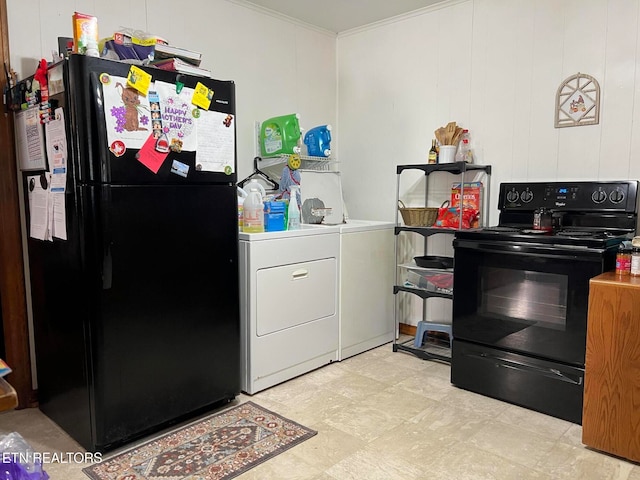 kitchen with independent washer and dryer and black appliances