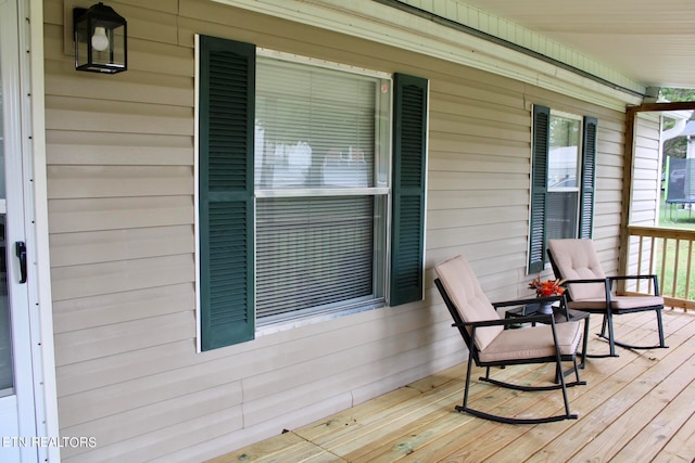 deck featuring covered porch