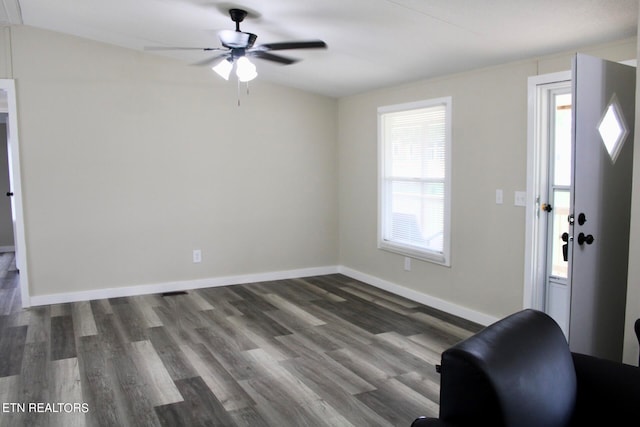 entrance foyer featuring dark hardwood / wood-style floors and ceiling fan