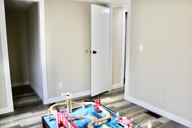 bedroom featuring hardwood / wood-style floors