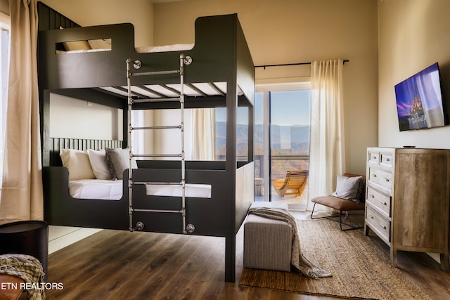 bedroom featuring wood-type flooring