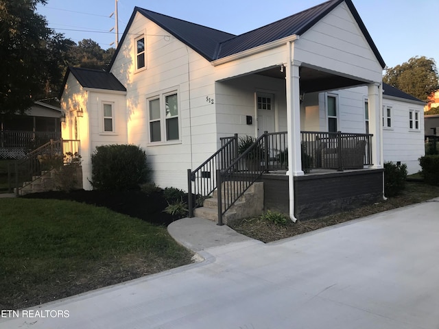 bungalow-style house with covered porch