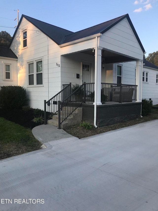 view of front of home featuring covered porch