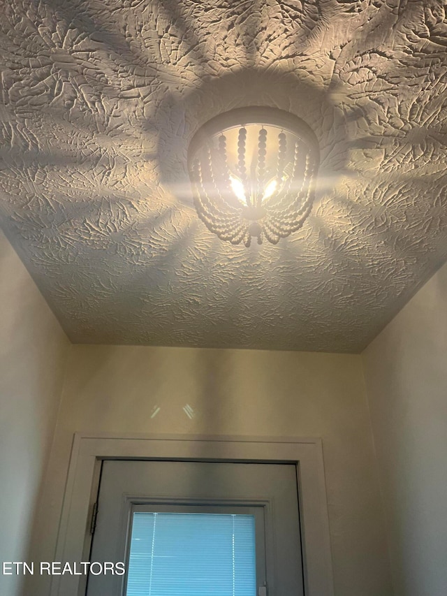 interior details with a textured ceiling