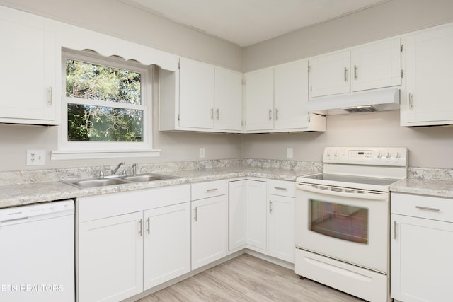 kitchen featuring light hardwood / wood-style flooring, white appliances, white cabinetry, and sink