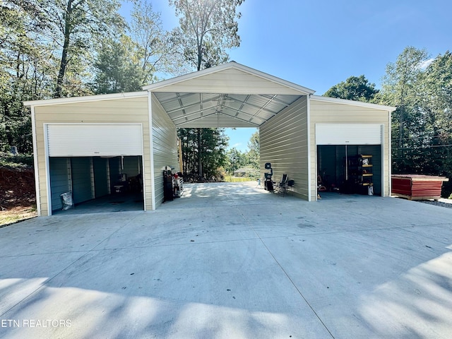 garage featuring a carport