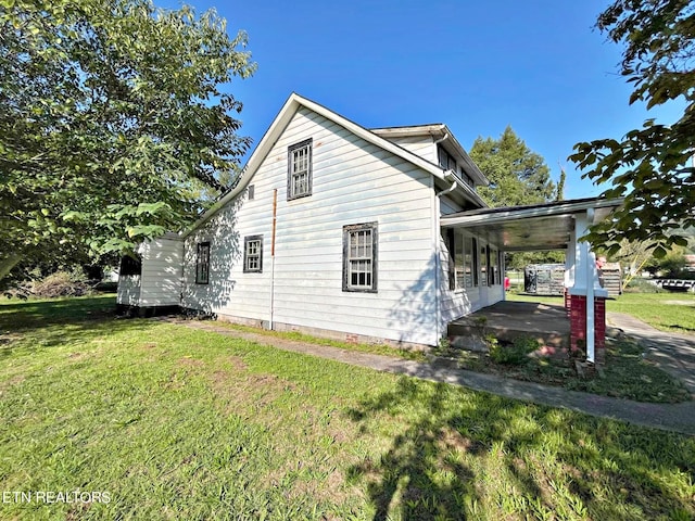 view of home's exterior featuring a yard