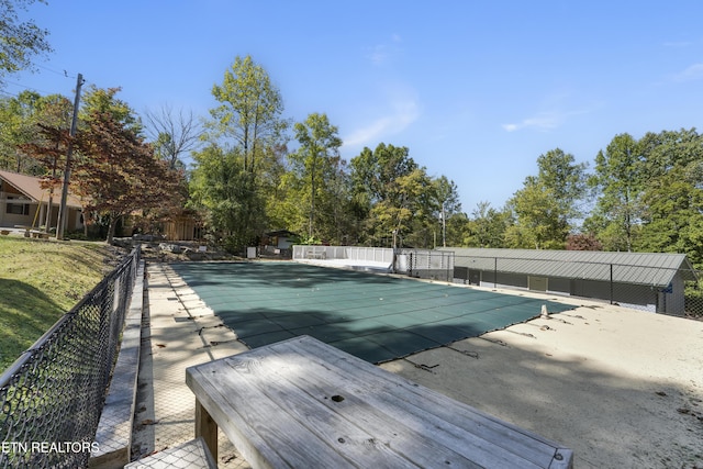 view of pool featuring a patio