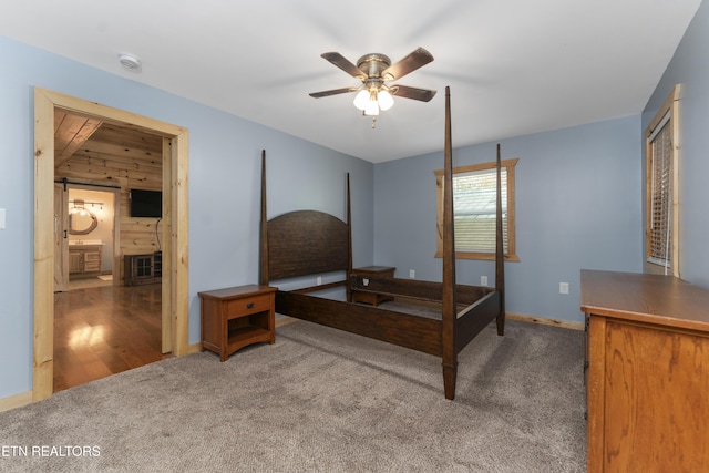 carpeted bedroom with ceiling fan