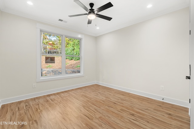 unfurnished room with visible vents, baseboards, recessed lighting, light wood-style flooring, and a ceiling fan