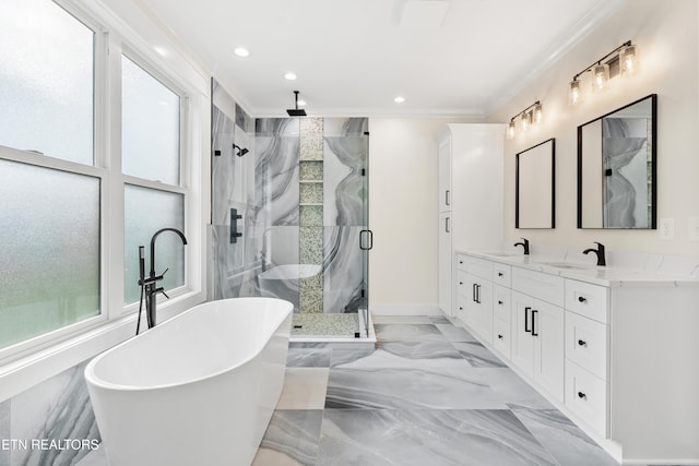 full bath with a wealth of natural light, marble finish floor, a stall shower, and ornamental molding