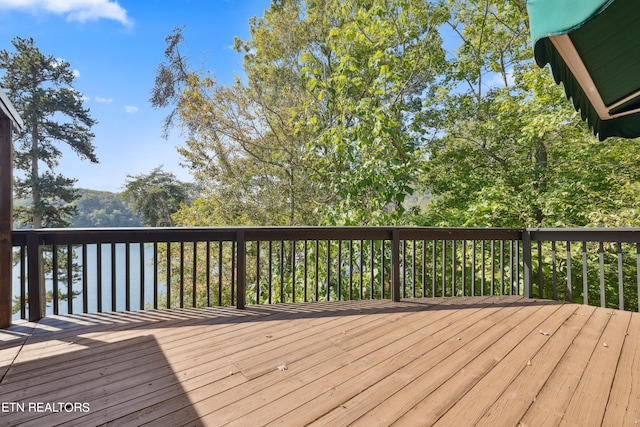 deck featuring a water view