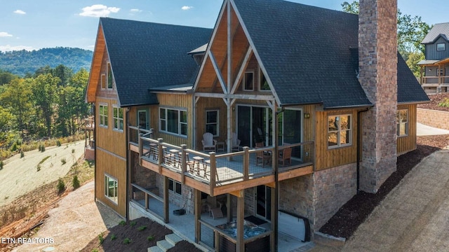 back of house featuring a patio area