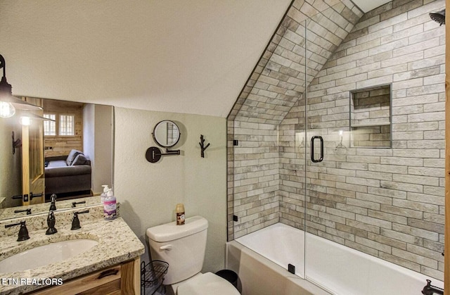 full bathroom with vanity, toilet, vaulted ceiling, and bath / shower combo with glass door