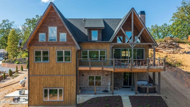 rear view of house featuring a patio