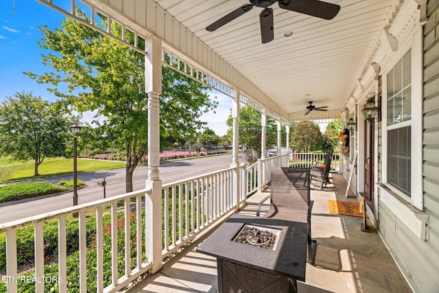 view of patio / terrace featuring ceiling fan and a porch