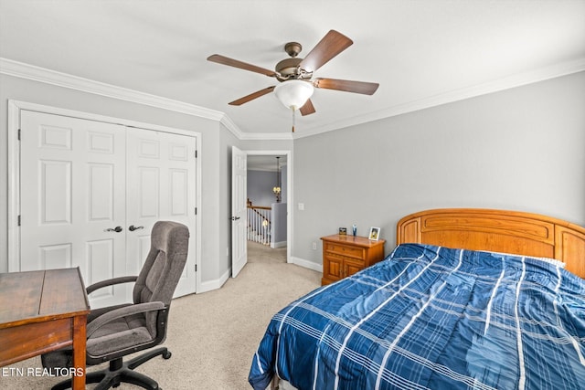 bedroom with a closet, light colored carpet, ceiling fan, and crown molding