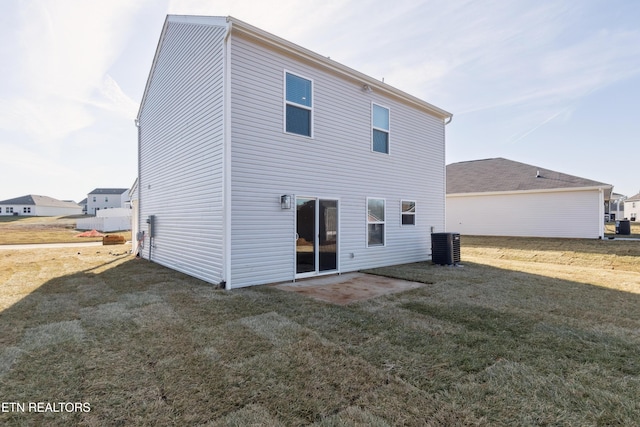 7821 Night Shade Ln, Knoxville, TN 37938 - rear view of property featuring a lawn and central AC