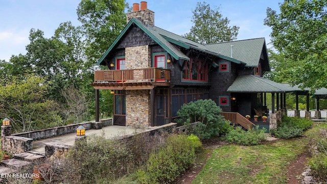 rear view of house with a patio area