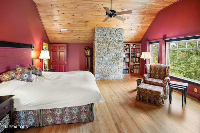 bedroom with wooden ceiling, light wood-type flooring, ceiling fan, and high vaulted ceiling