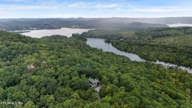 aerial view featuring a water and mountain view