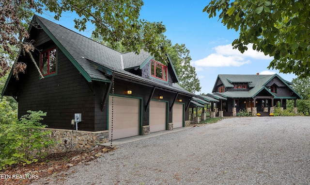 view of front of property featuring a garage