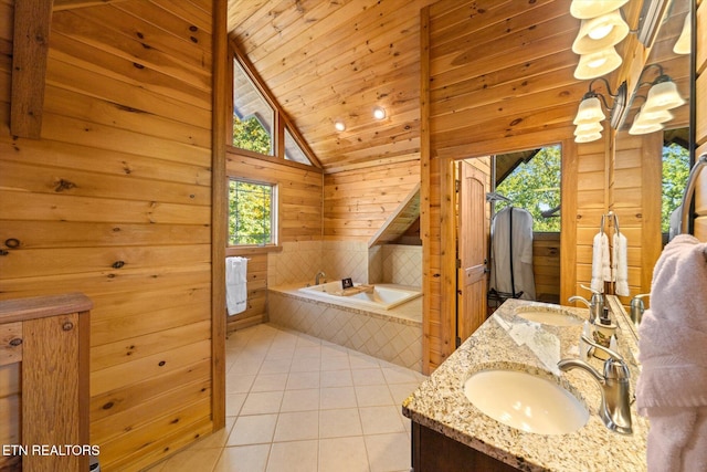 bathroom with tiled bath, tile patterned floors, wooden walls, and vaulted ceiling