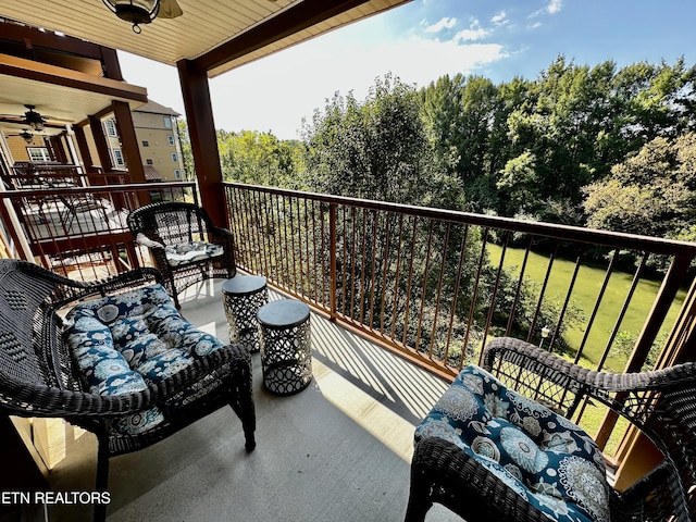 balcony featuring a ceiling fan
