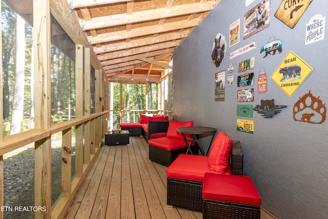 sunroom with lofted ceiling