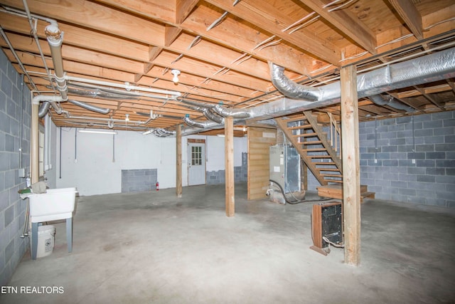 basement featuring heating unit