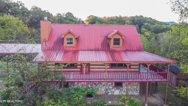 view of front of house featuring a wooden deck