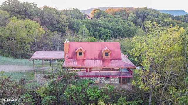 birds eye view of property featuring a mountain view