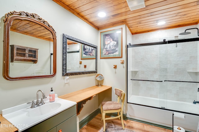 bathroom with vanity, hardwood / wood-style floors, wooden ceiling, and enclosed tub / shower combo