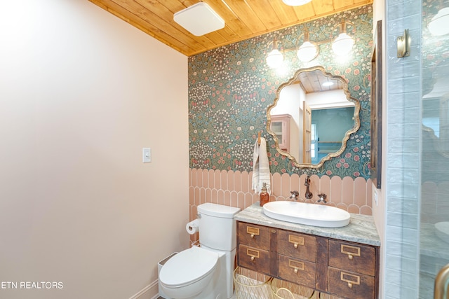 bathroom with wood ceiling, vanity, and toilet