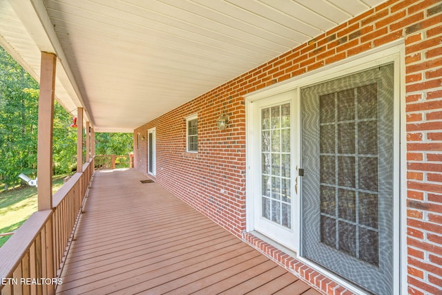 wooden terrace with covered porch