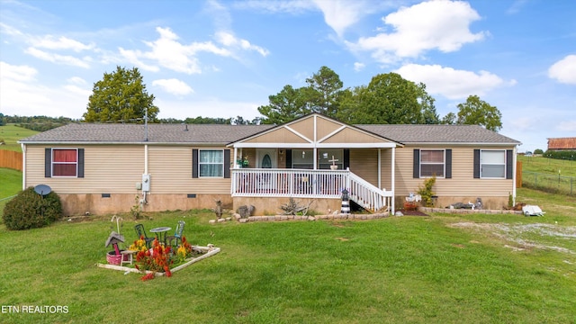 view of front of home with a porch and a front lawn