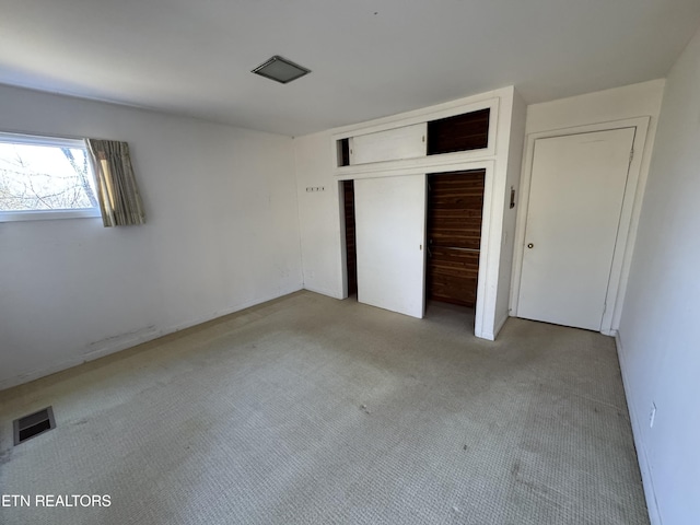 unfurnished bedroom with a closet