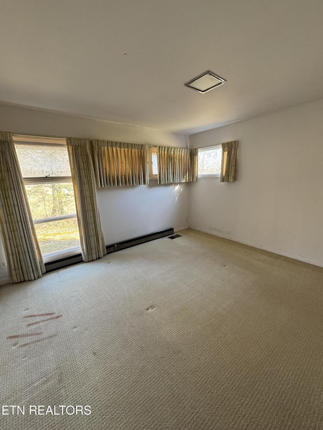 empty room featuring carpet floors