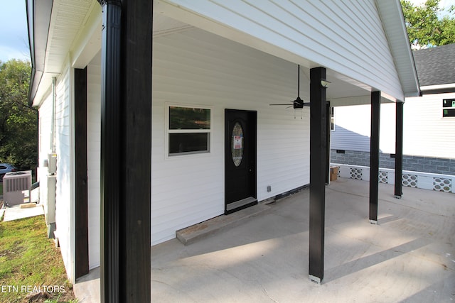 view of patio featuring cooling unit and ceiling fan