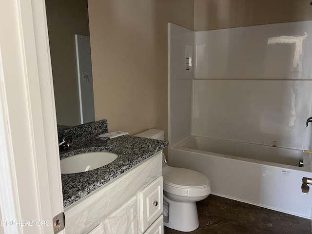 full bathroom featuring toilet, tub / shower combination, and vanity