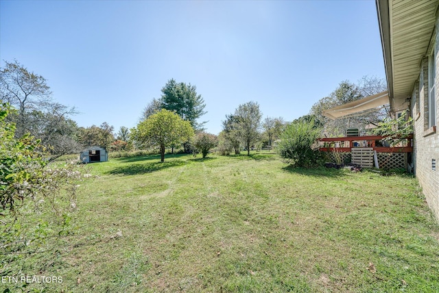 view of yard featuring a deck