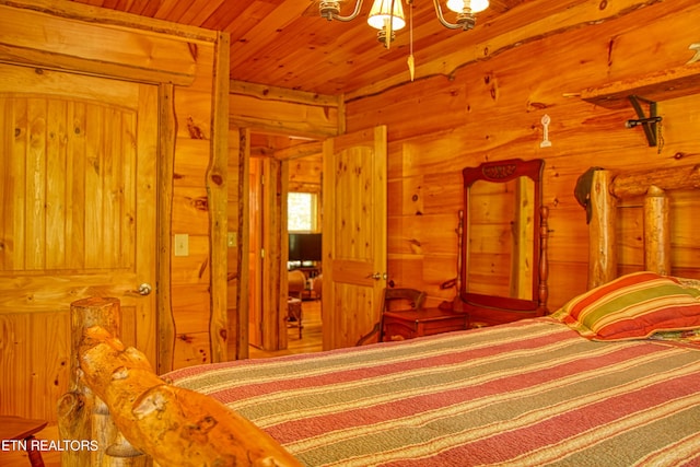 unfurnished bedroom featuring wooden walls