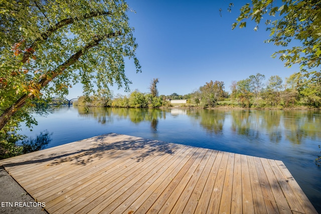 view of dock with a water view