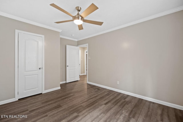 unfurnished bedroom featuring ceiling fan, ornamental molding, and dark hardwood / wood-style flooring