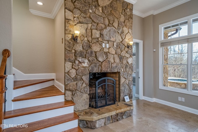 unfurnished living room featuring a stone fireplace and crown molding