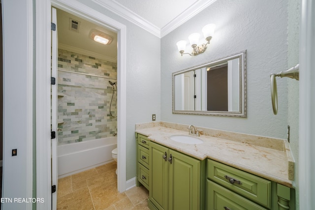 full bathroom with crown molding, vanity, toilet, and tiled shower / bath combo