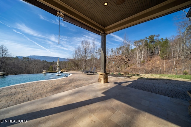 view of patio with a mountain view