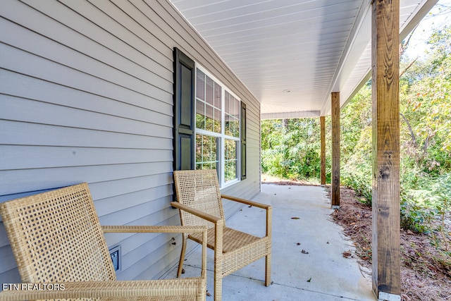 view of patio featuring a porch